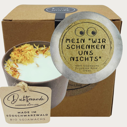 Wir schenken uns nichts Geschenk Duftkerze mit lustigen Augen dekoriert